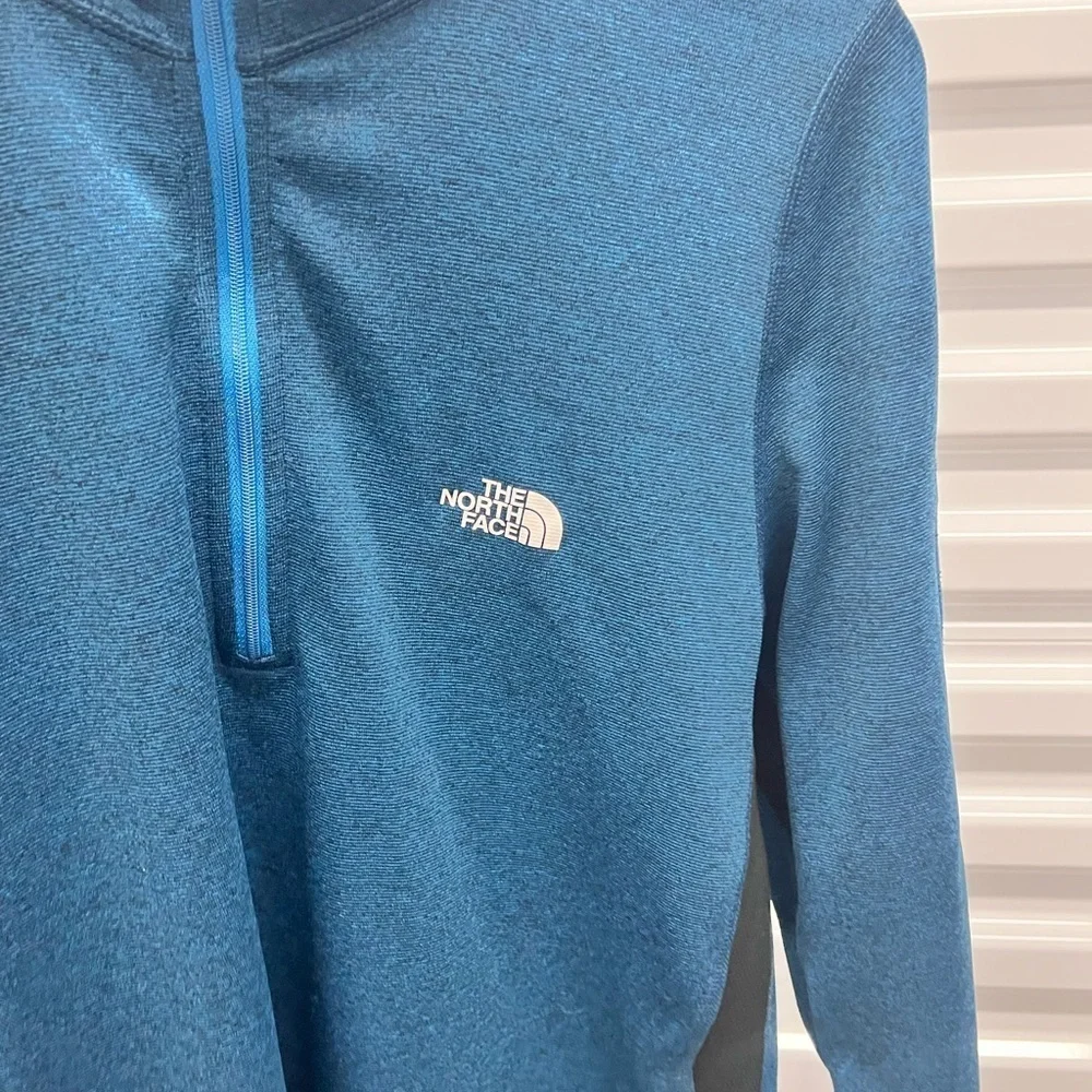 The North Face teal blue quarter zip pullover size M